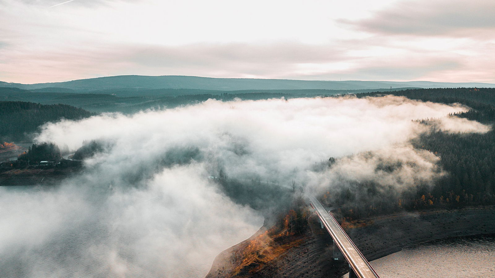 A view overlooking hills and clouds