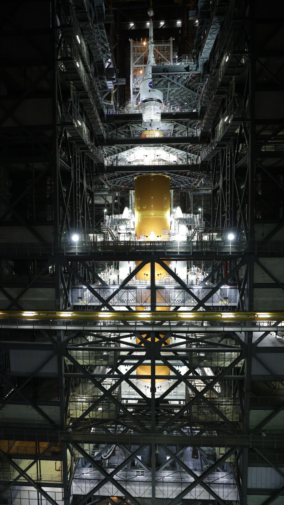 Teams at NASA’s Kennedy Space Center have lifted the Orion spacecraft and placed it on top of the Space Launch System rocket.