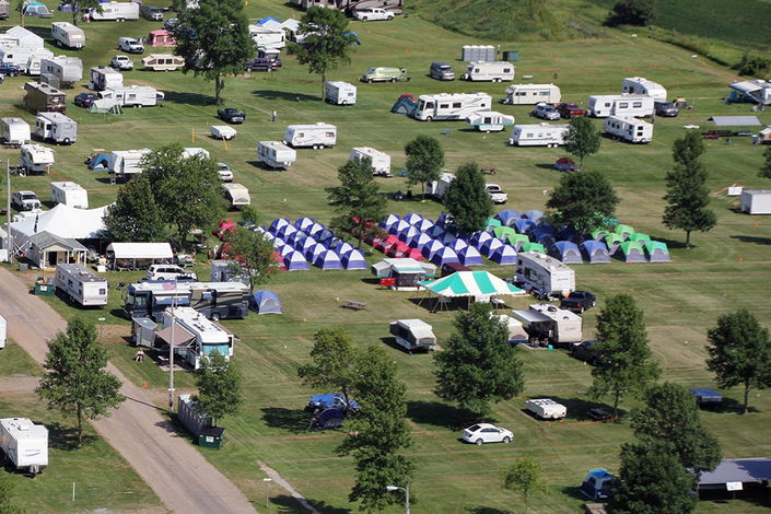 Tents and RVs start to fill in at EAA AirVenture's Camp Scholler.