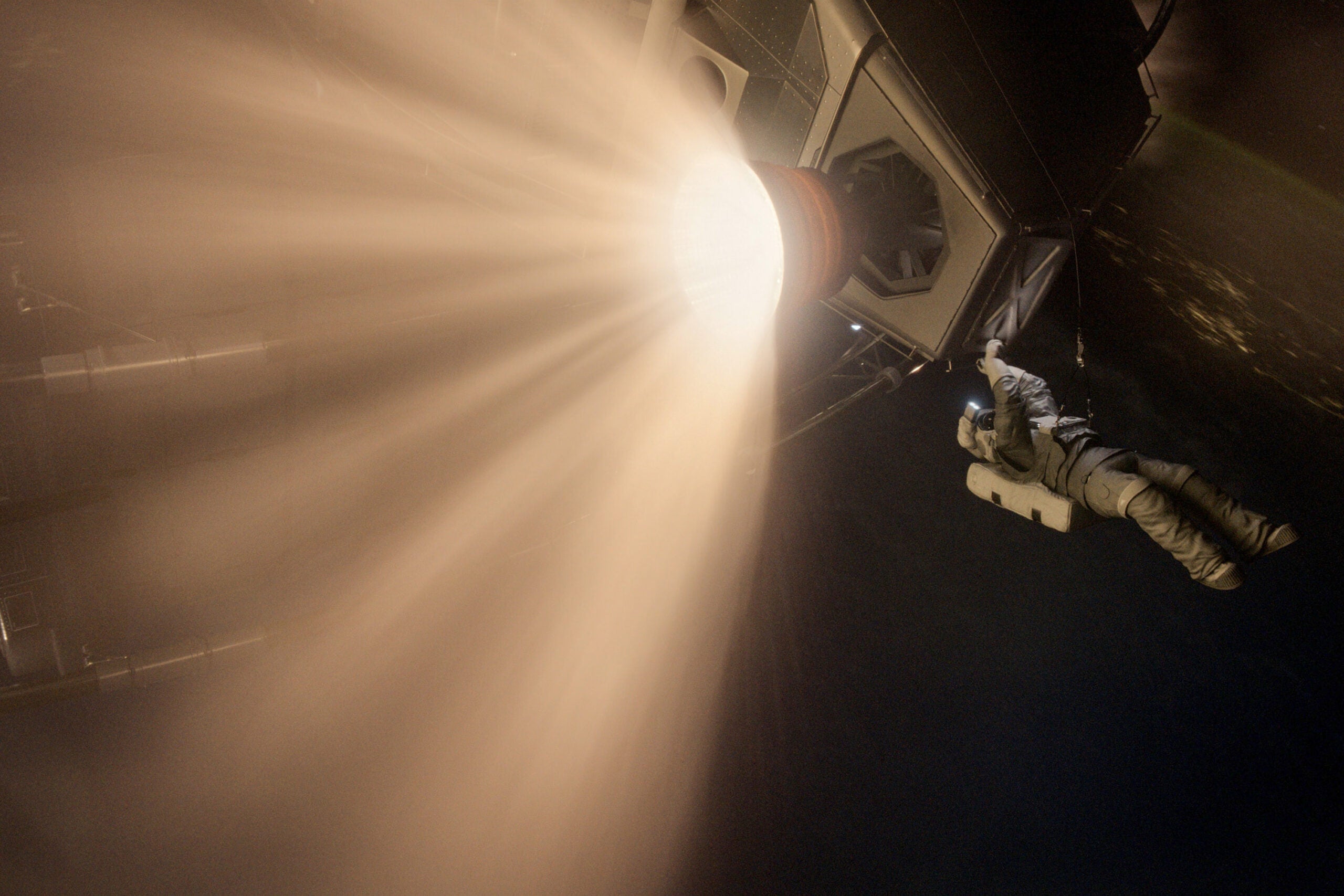 Astronaut Repairing Spacecraft