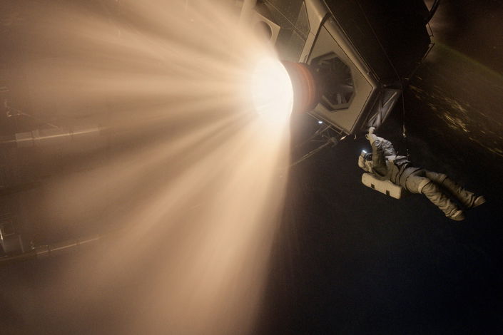 Astronaut Repairing Spacecraft