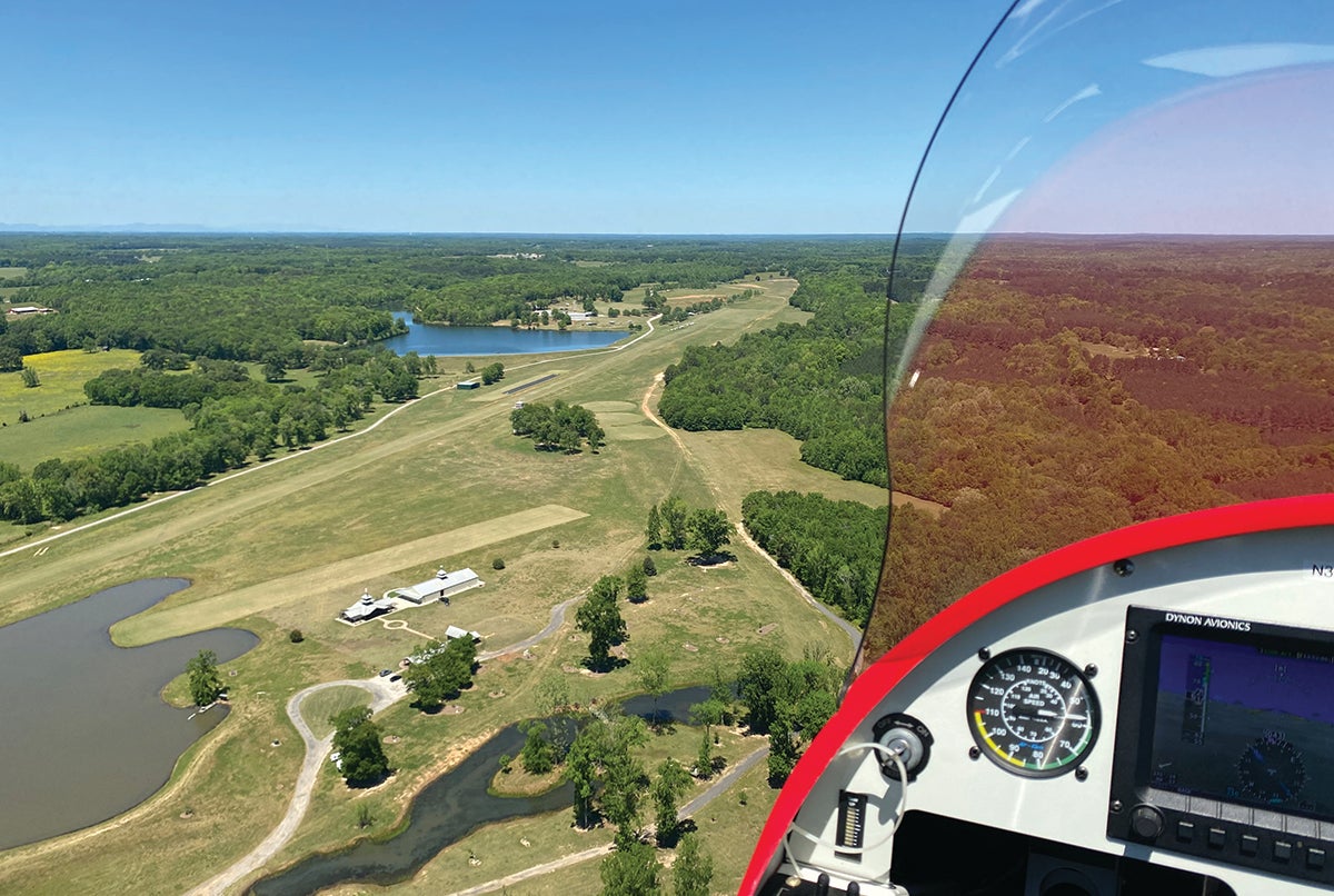 Aerial view of a grass landing strip at Triple Tree Aerodrome in South Carolina