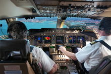 Pilots in a flight deck