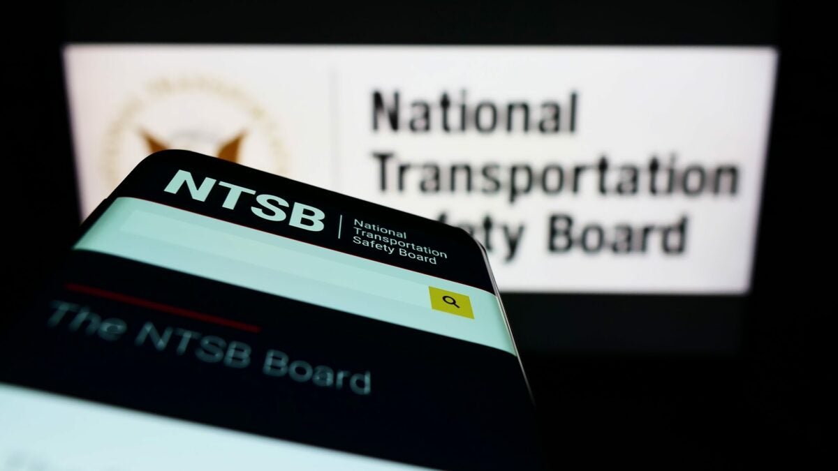 A former member of the National Transportation Safety Board is suing President Donald Trump.