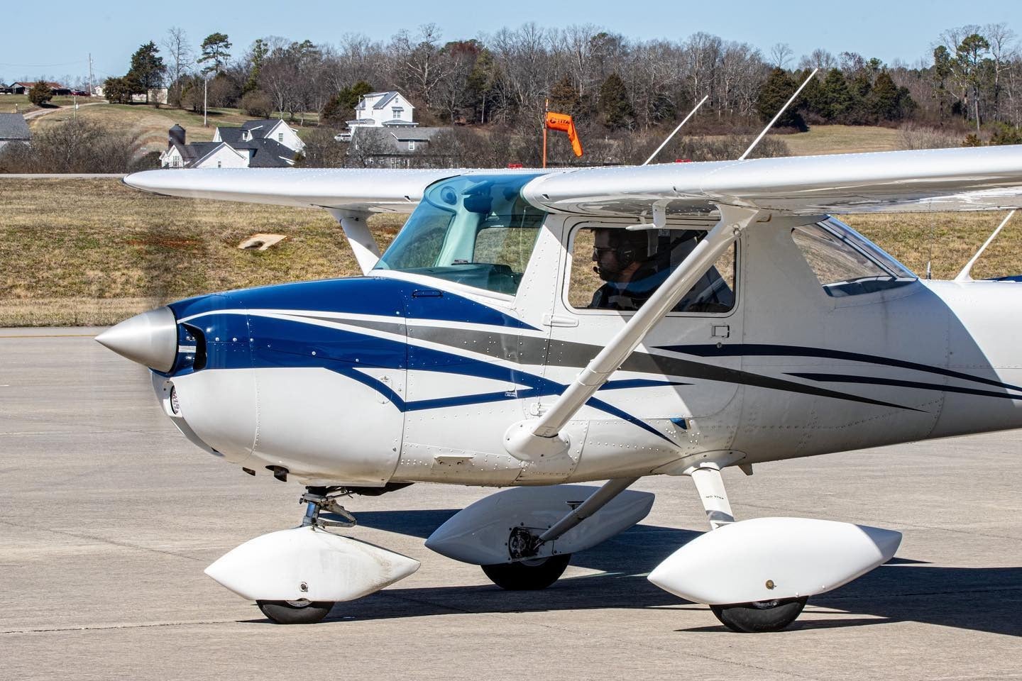 Pilot in plane on ground