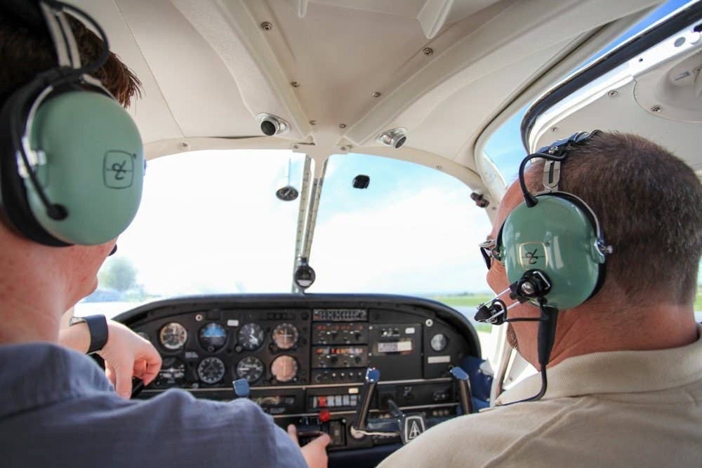 Two people in the cockpit