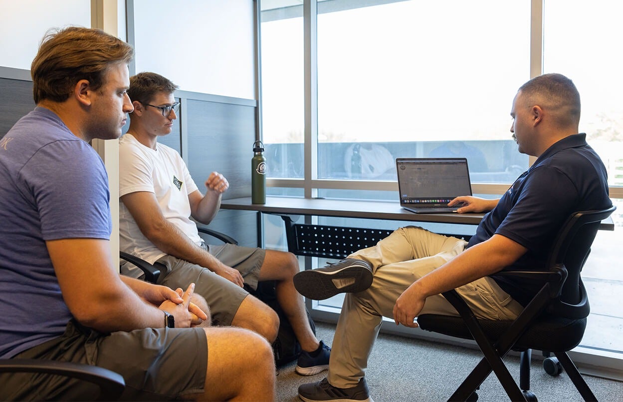 Students working at a flight school