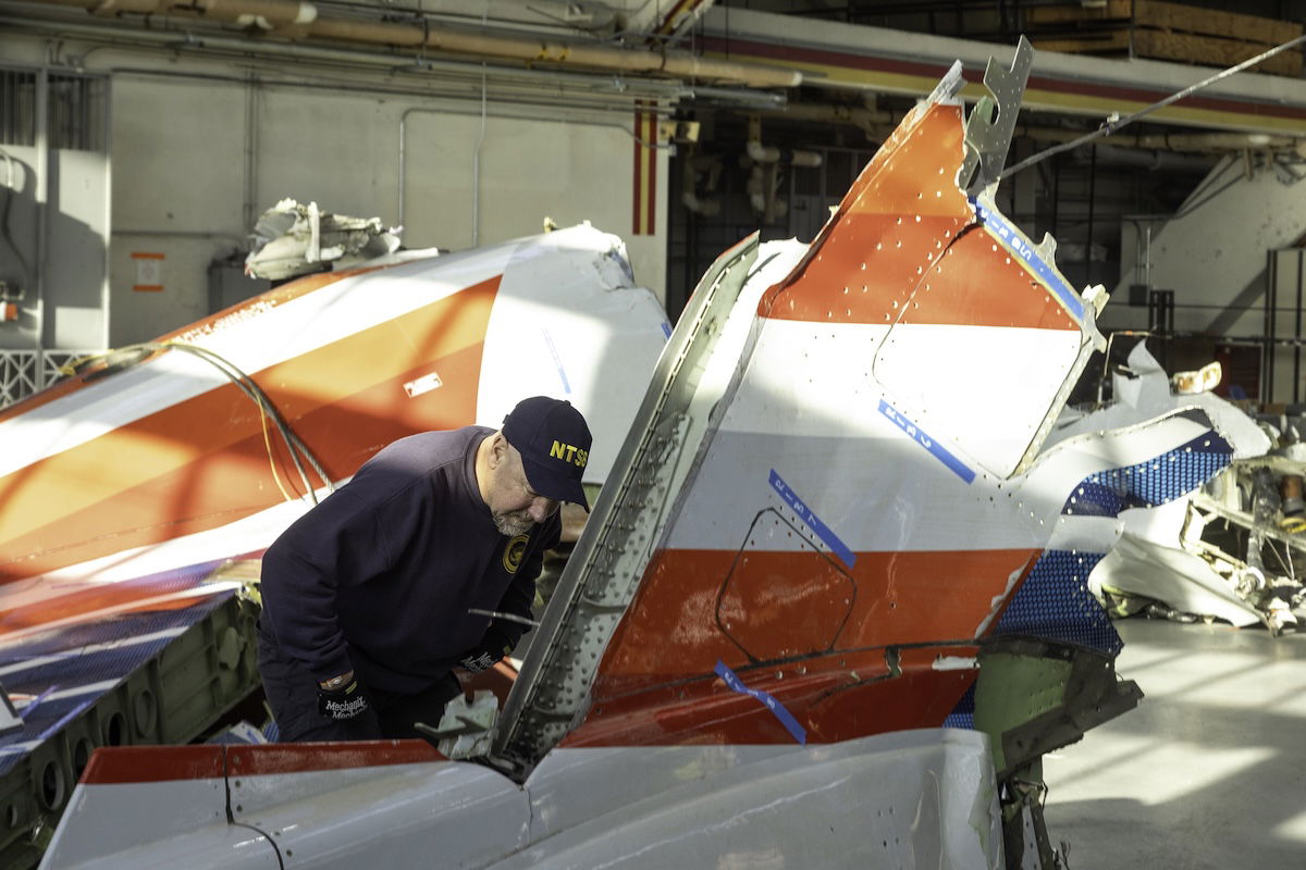 NTSB investigators inspect wreckage of CRJ-700