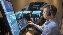 Student working at FlightSafety International