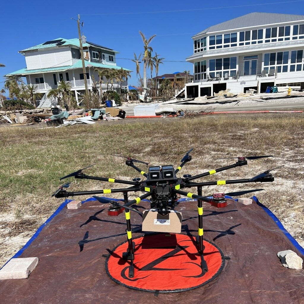 An A2Z delivery drone is pictured in front of some of the wreckage on Sanibel Island.